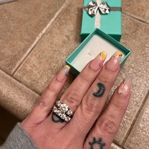 Moissanite Fire engagement and wedding band from JTV